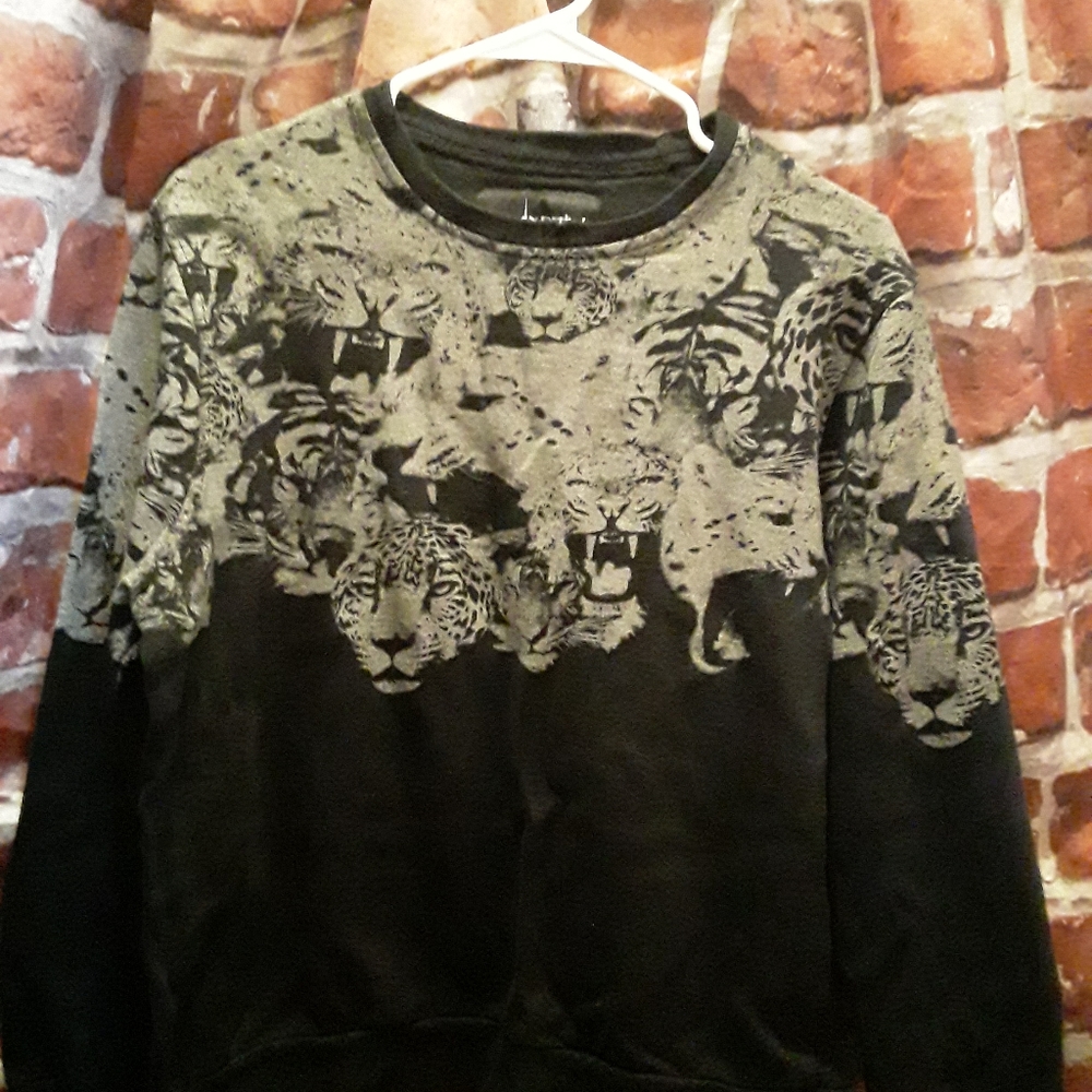 Black sweater size large with animal design print.